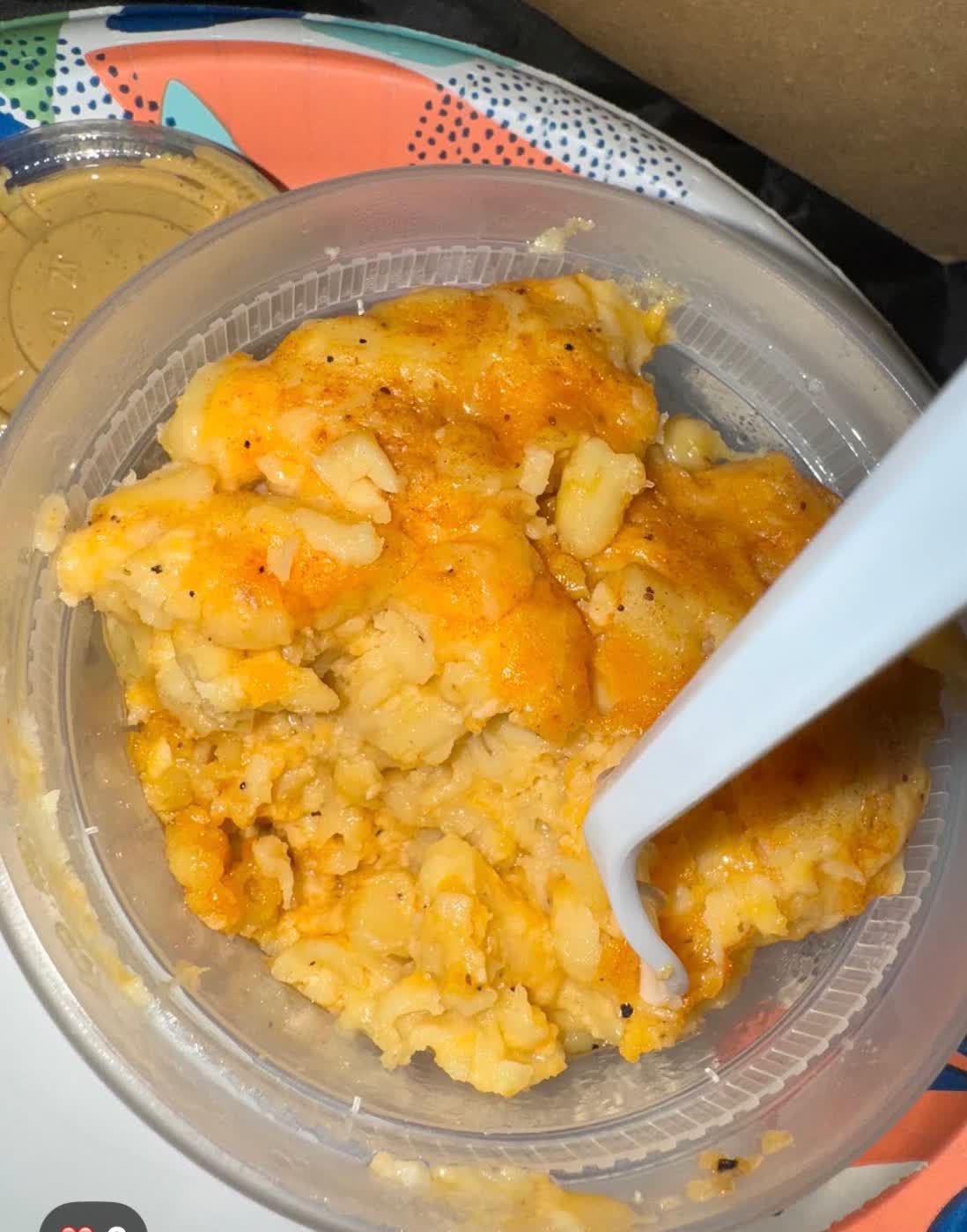 Container of baked mac and cheese